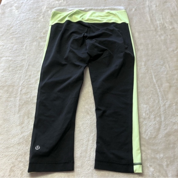 lululemon Neon Yellow & Black Crop Athletic Leggings Size 4 - Picture 3 of 12